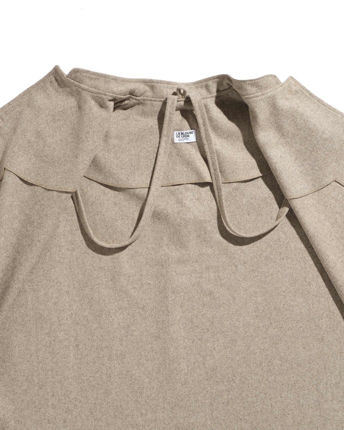 Cape de berger en laine burel beige avec capuche amovible